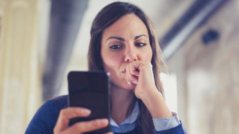 A woman on her smartphone