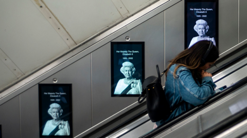 Woman travelling on London Underground