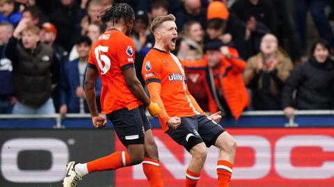 Luke Berry celebrates scoring equaliser for Luton against Nottingham Forest