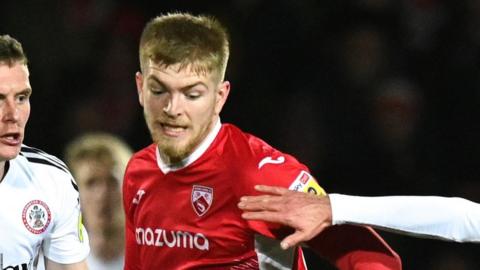 Kieran Phillips in action for Morecambe