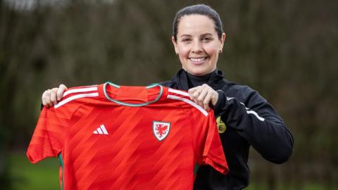 Rhian Wilkinson with Wales shirt