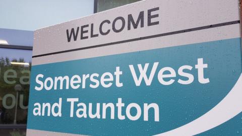 Somerset West & Taunton sign