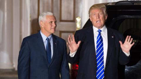 US President-elect Donald Trump and US Vice President-elect Mike Pence depart after a day of meetings at the clubhouse of Trump National Golf Club on November 19, 2016 in Bedminster, NJ.