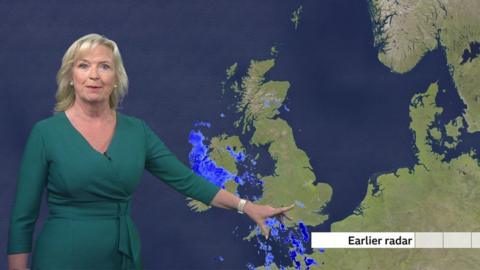 BBC weather presenter Carol Kirkwood in front of UK map