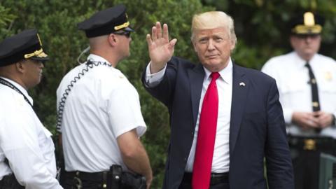 President Trump and some uniformed Secret Service agents