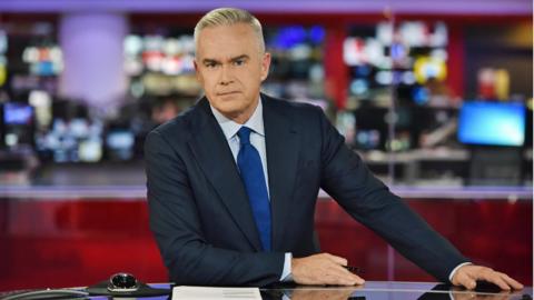 Huw Edwards presenting BBC News