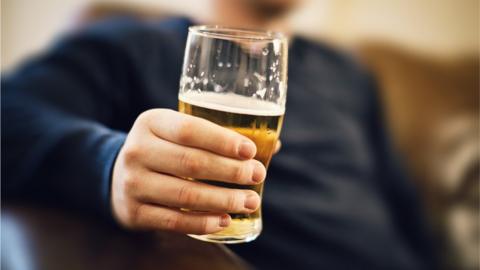 Man with a glass of beer