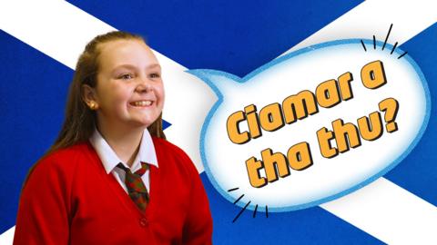 A school pupil in front of a Scottish flag, with text reading "Ciamar a tha thu?" meaning "how are you?" in Gaelic.