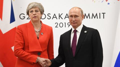 Theresa May and Vladimir Putin