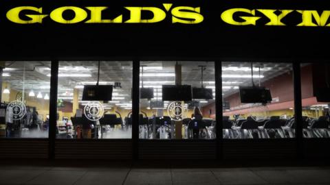 People work out at a Gold’s Gym in Washington, DC.