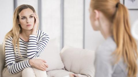 Woman talking to a therapist