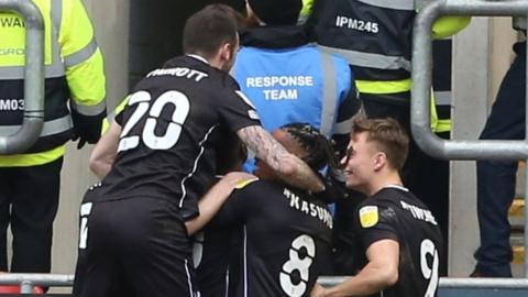 MK Dons celebrate victory at Rotherham