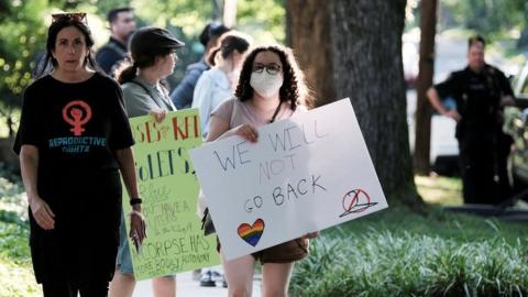 protesters outside the home of supreme court justice brett kavanaugh