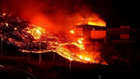 Lava burns building