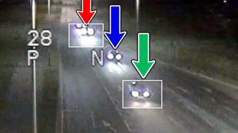 Screenshot from CCTV showing three cars in a line