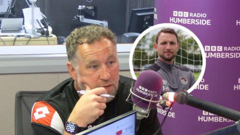 Football manager David Artell sitting behind a microphone in a studio setting with an inset of Alex Hughes