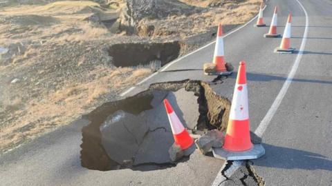 A view of cracks, emerged on a road due to volcanic activity, near Grindavik, Iceland November 13, 2023