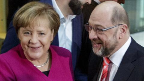 Acting German Chancellor Angela Merkel and Social Democratic Party (SPD) leader Martin Schulz - 7 January 2018