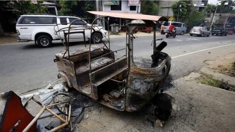 Burnt out rickshaw