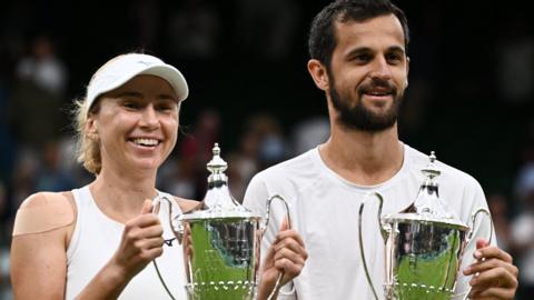 Lyudmyla Kichenok and Mate Pavic with their mixed doubles trophies