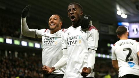 Derby players celebrate a goal against Bristol Rovers