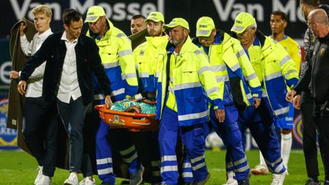 Etienne Vaessen is stretchered off