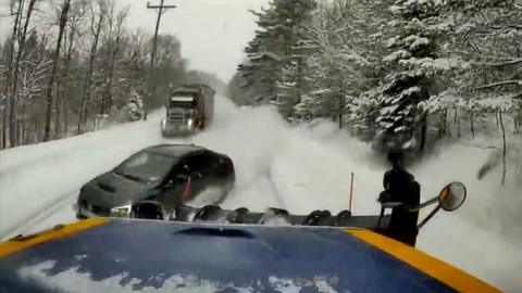 Car crashing into snowplough