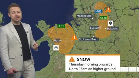Tomasz Schafernaker stands in front of a weather map of England