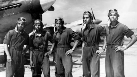 Tuskegee Airmen at Tuskegee Army Flying School, with fighter aircraft, Tuskegee, Alabama, 1942