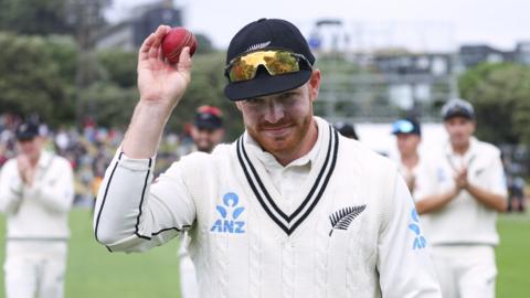 New Zealand's Glenn Phillips celebrates his wicket haul