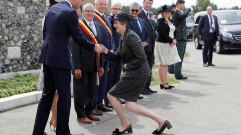 Theresa May is greeted by Catherine, Duchess of Cambridge and Prince William, Duke of Cambridge ahead of a ceremony at the Commonwealth War Graves Commisions's Tyne Cot Cemetery in Ypres, Belgium