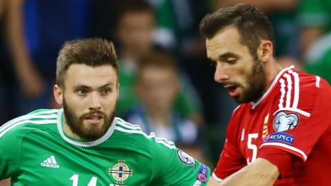 Stuart Dallas battled with Hungary's Attila Fiola in the Euro 2016 qualifier at Windsor Park in September 2015