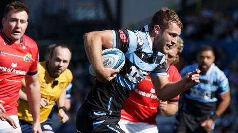 Max Llewellyn streaks away to score a try for Cardiff