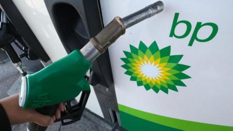 BP logo and petrol pump nozzle