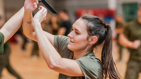 Woman in self-defence class