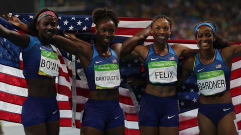 American sprinters Tori Bowie, Tianna Bartoletta, Allyson Felix and English Gardner celebrate their 4x100m relay gold at the Rio 2016 Olympics