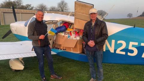 Dick Beath and Georg Gruber,in front of the plane