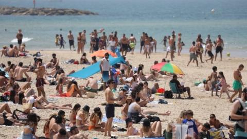 people on Tel Aviv beach