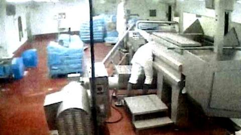 A CCTV still from 7 January 2019 shows the worker using the machinery