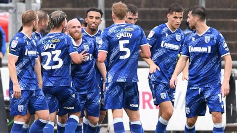 Gillingham players celebrate