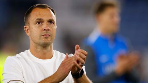 Birmingham City boss Chris Davies applauding fans