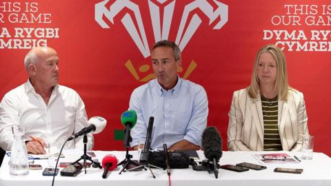 Richard Collier-Keywood, WRU chairman, Dave Reddin, WRU director of rugby and elite performance and Abi Tierney, WRU chief executive speaking at a press conference at the Principality Stadium in Cardiff
