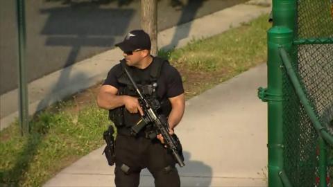 Policeman guarding the field