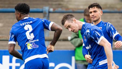 Chris Venables celebrates after scoring for Penybont