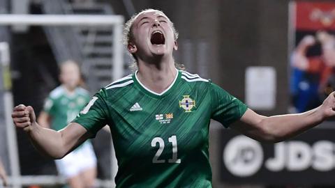 Kerry Beattie celebrates scoring against North Macedonia