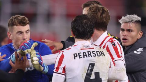 Stoke City and Southampton players scuffle after the final whistle.