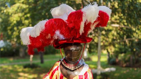 Model in reproduced Schwarz headdress