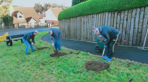 Residents planted nearly 30 fruit trees