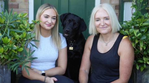 Evie and Jessica Niblock with Rebel