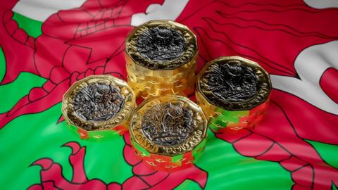 Welsh flag with pounds on it